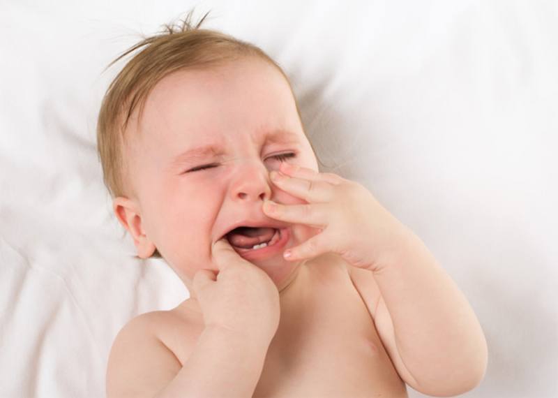أعراض ظهور أسنان الطفل